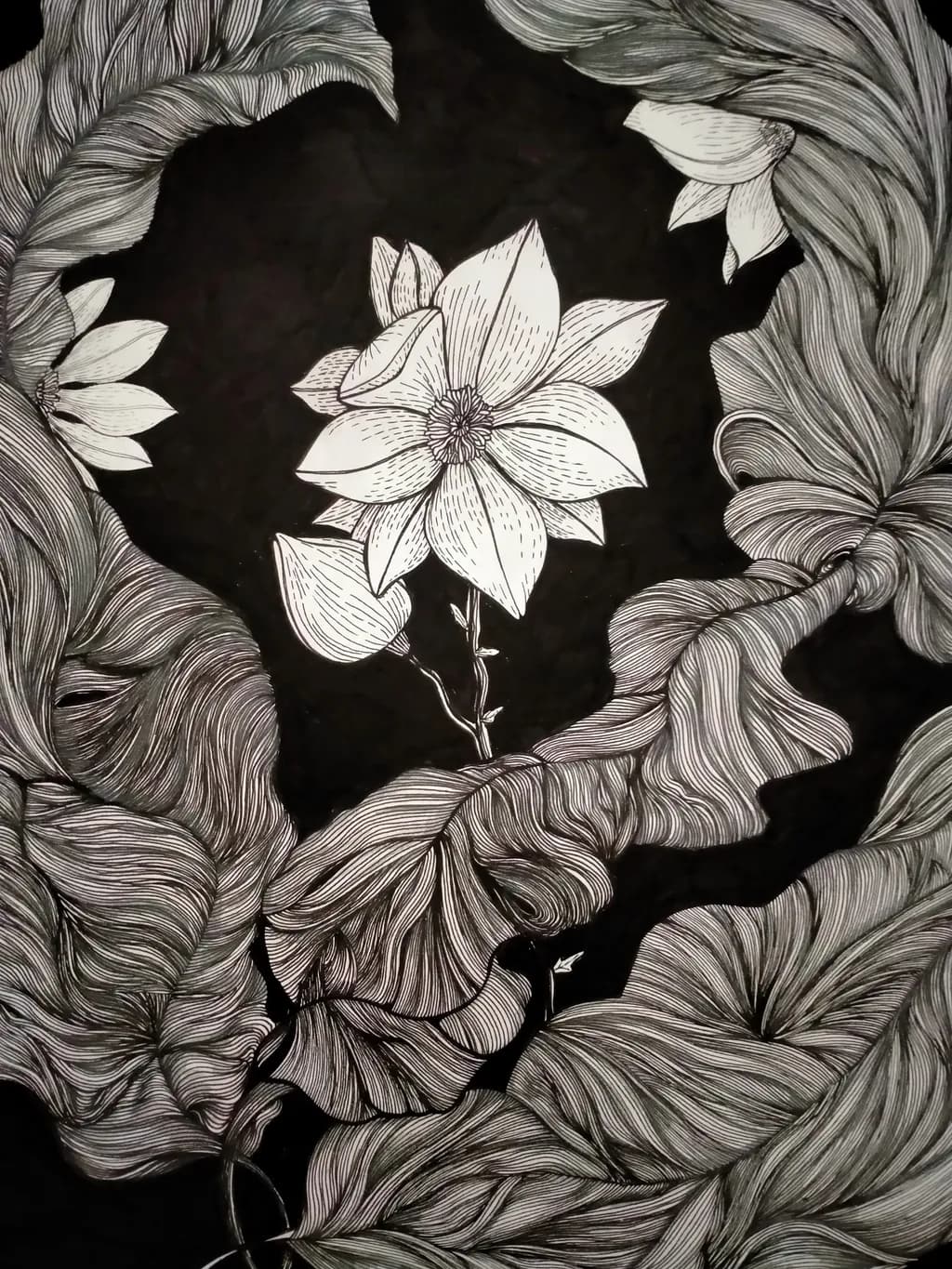 Whispers of Resilience: A Floral Embrace in Monochrome Elegance