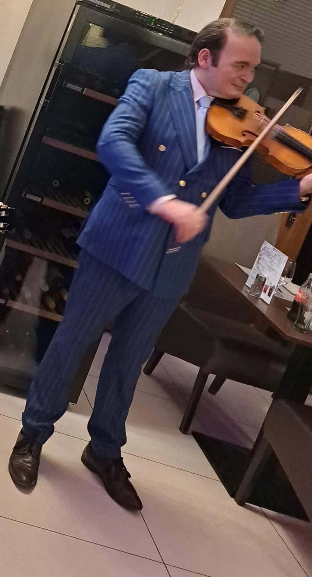 Elegant Violinist in Performance: A Captivating Moment of Musical Artistry