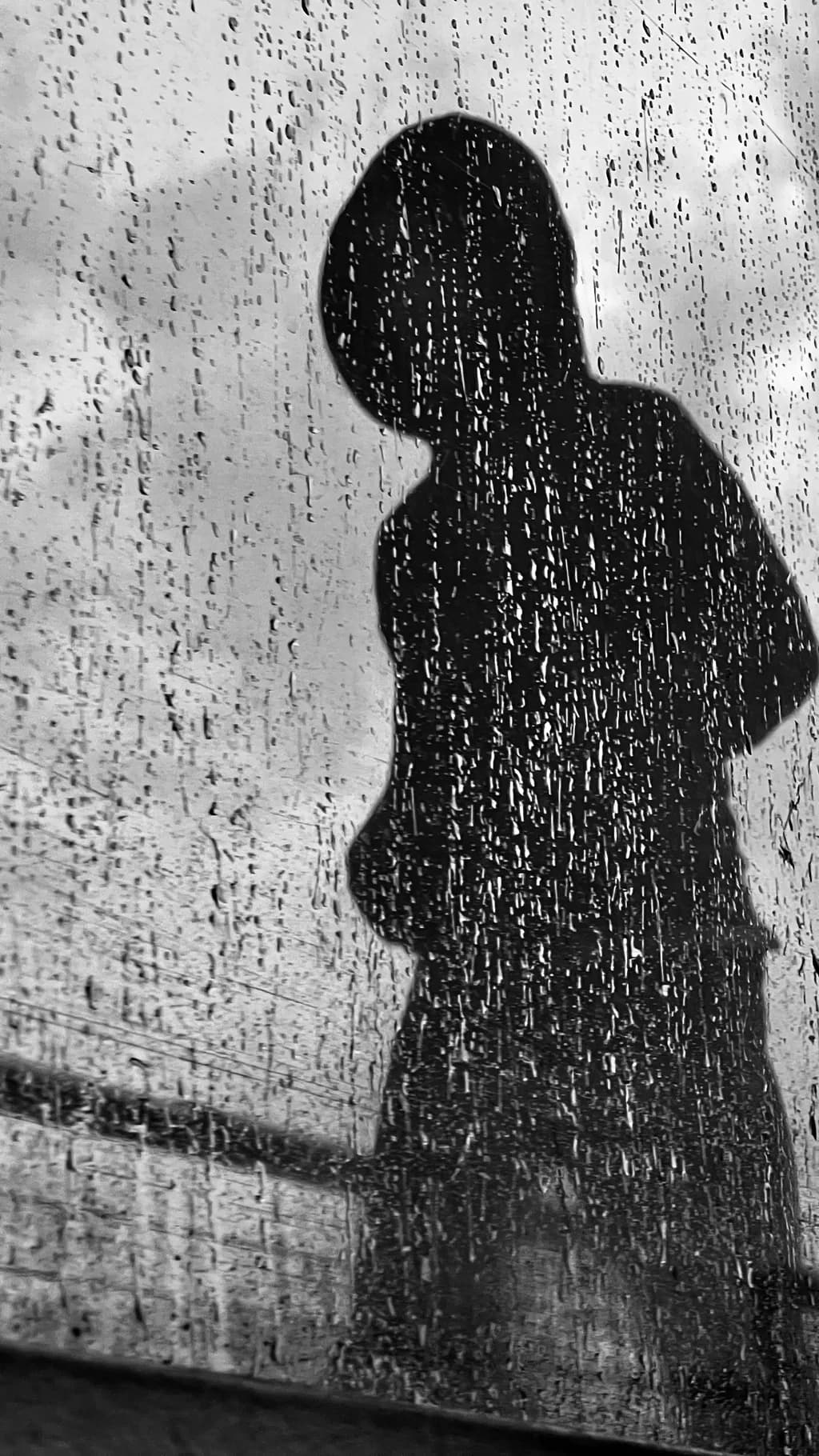 Rainy Window Silhouette