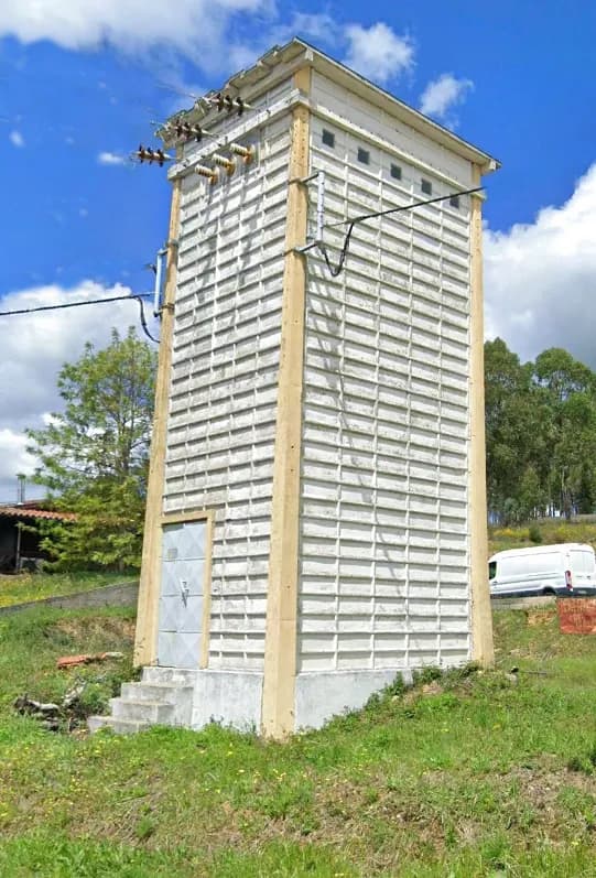 Urban Solitude: The Tower of Isolation in Nature's Embrace