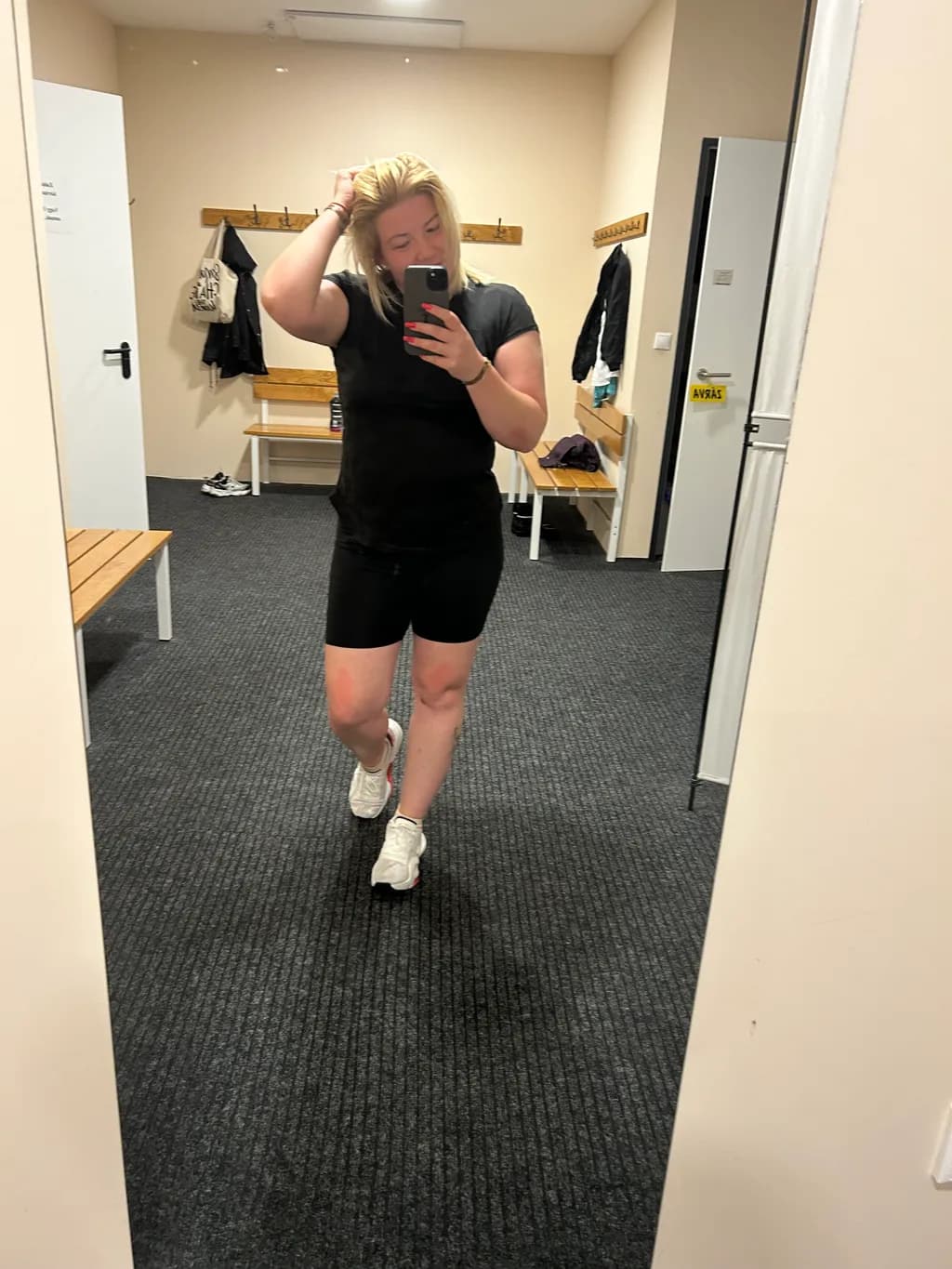 Reflections of Strength: A Casual Fitness Selfie in the Locker Room