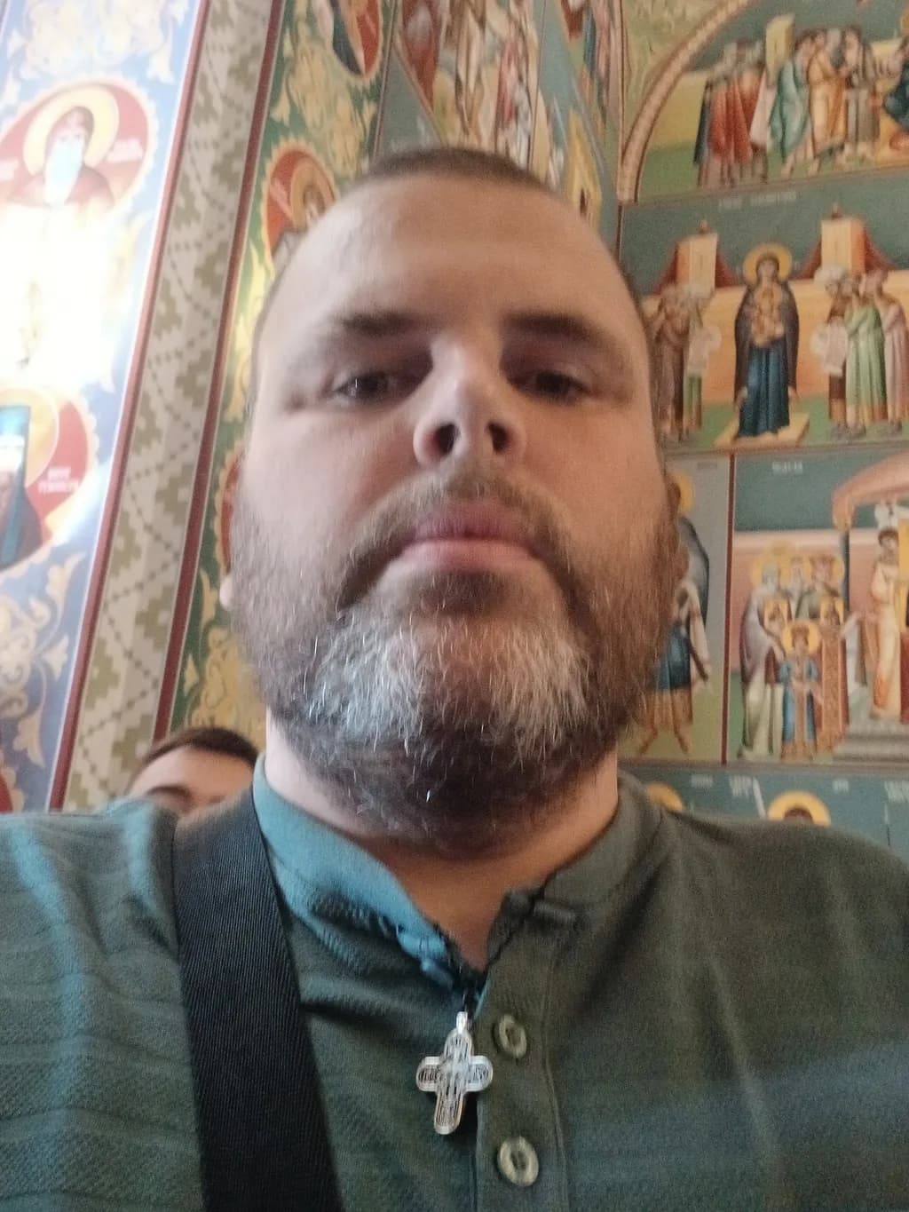 Bearded Reflection: A Selfie Amidst Sacred Icons