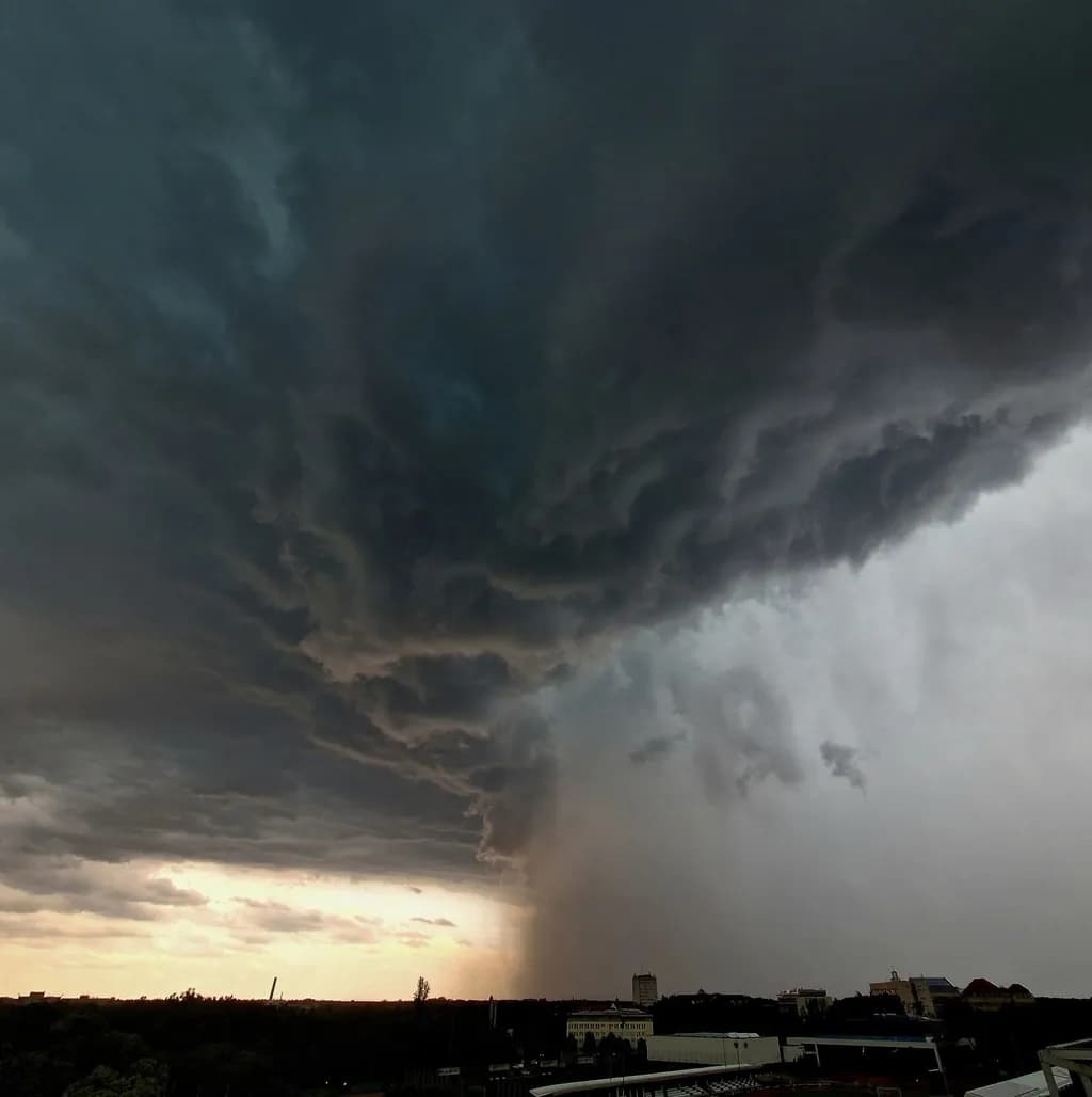 Tempestuous Skies: A Dance of Shadows and Light Over the Horizon