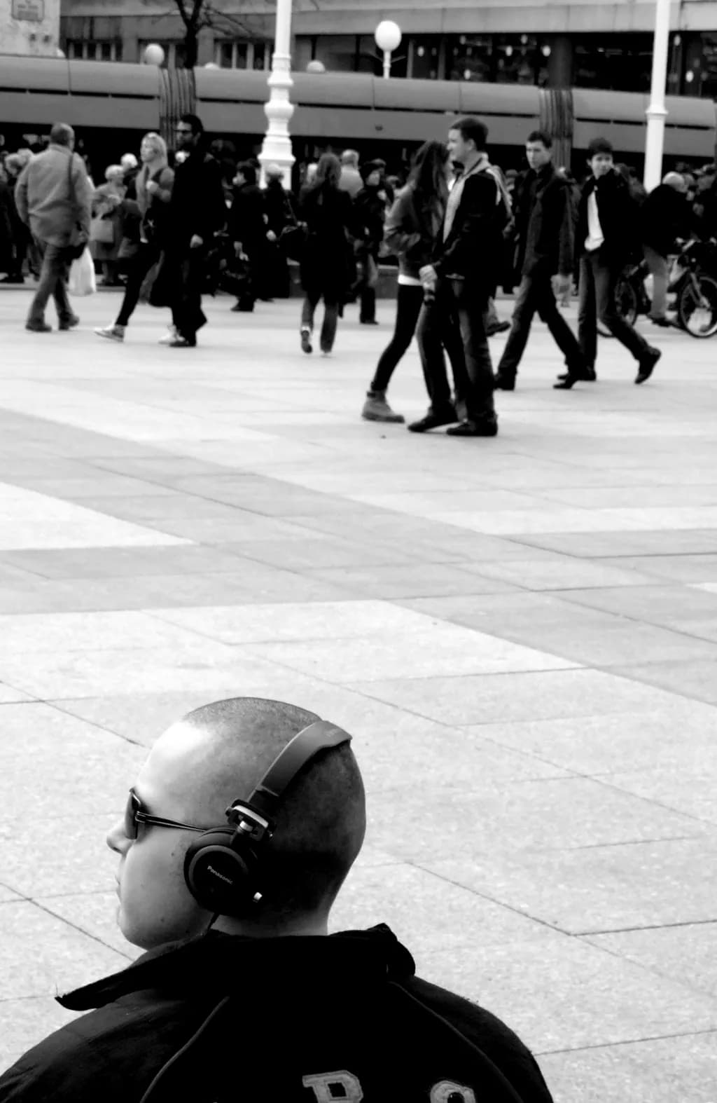 Urban Solitude: A Moment of Reflection in a Crowded World