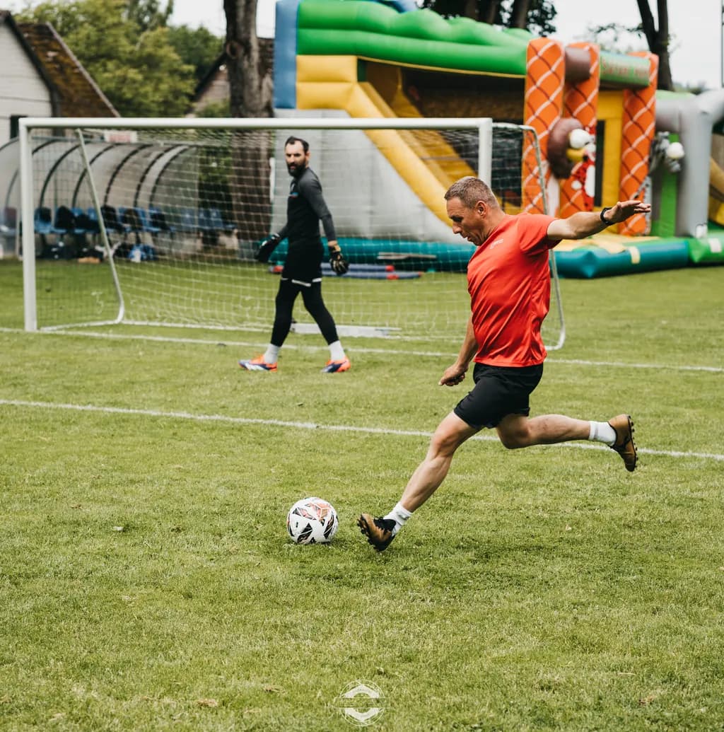 Dynamic Soccer Action: The Art of the Perfect Kick on the Playground
