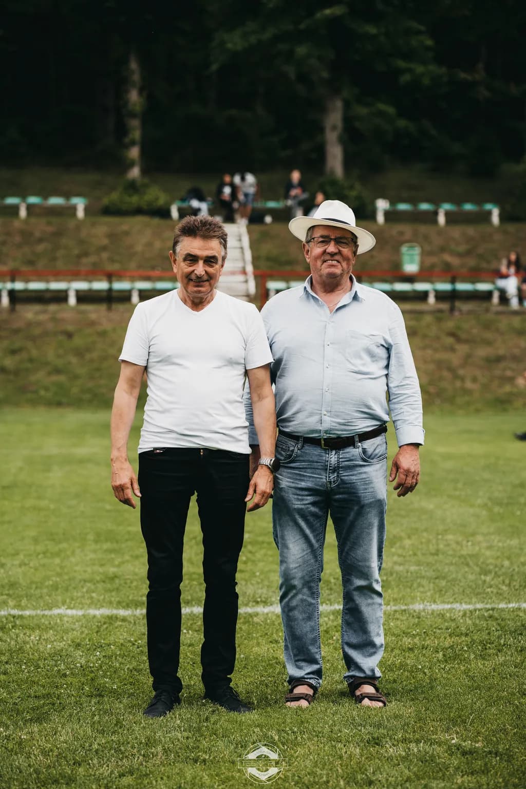 Joyful Moments in the Grass: A Celebration of Friendship and Togetherness