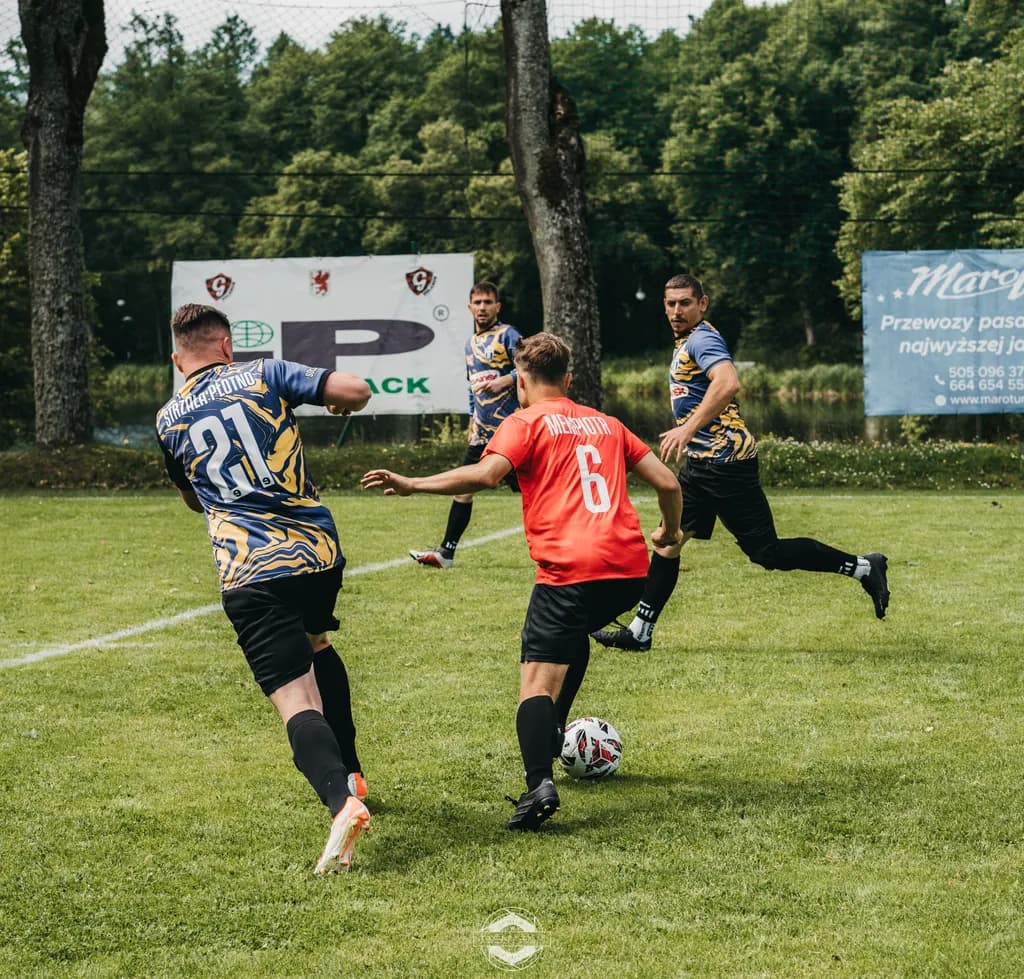 Dynamic Play on the Field: A Moment of Soccer Passion and Team Spirit