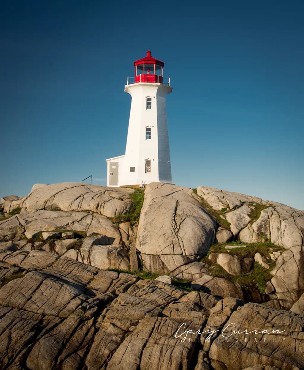 Guiding Light: A Coastal Lighthouse Standing Tall Against the Sky