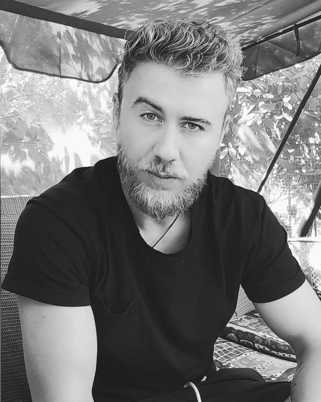 Capturing Intensity: A Portrait of Contemplation in Monochrome