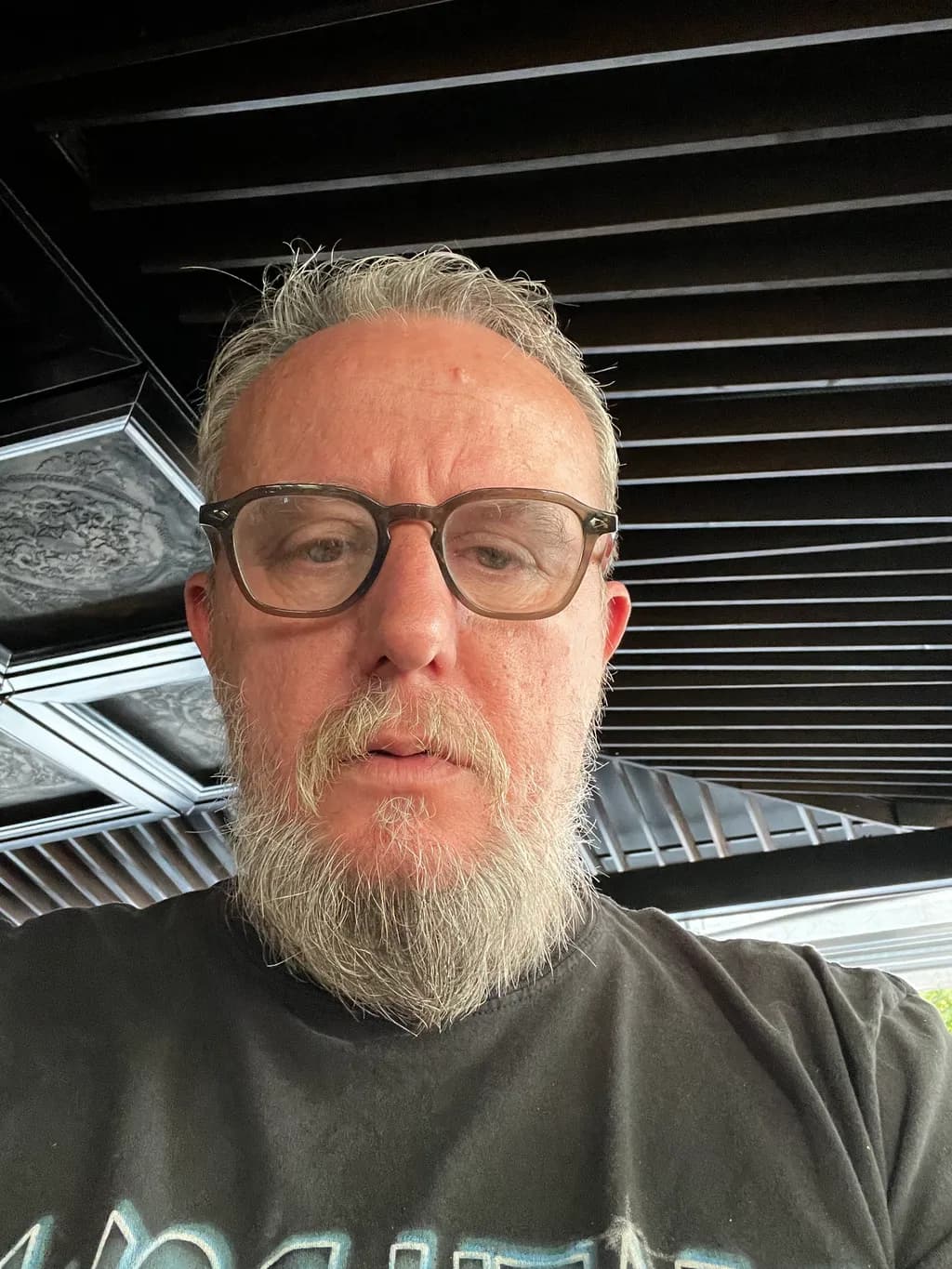 Serious Reflection: A Portrait of Contemplation in Casual Style