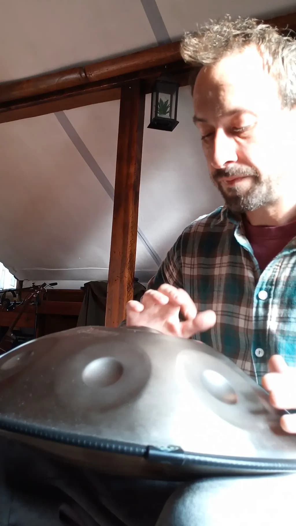 Melodic Journeys: The Art of Handpan Music in a Cozy Studio Setting