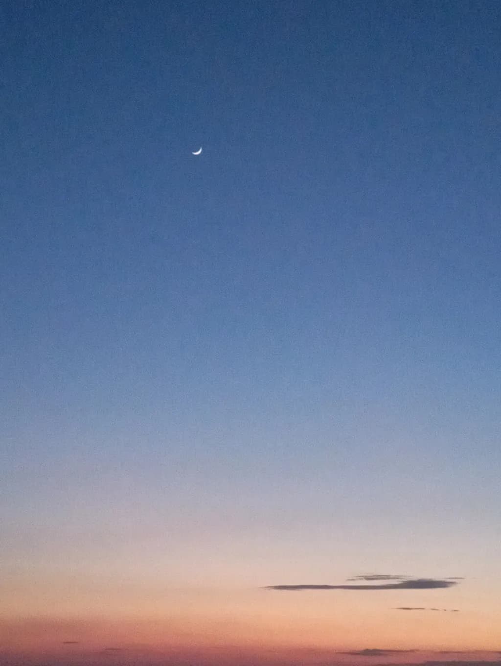 Whispers of Twilight: A Serene Moonlit Sky at Dusk