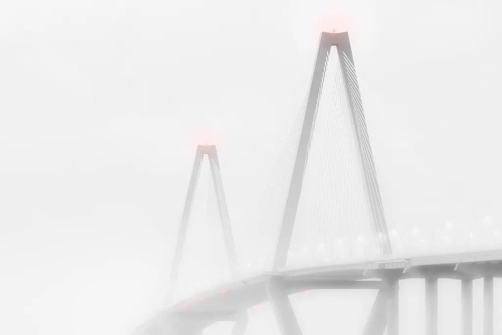 Ethereal Bridge: A Monochrome Journey Through Fog and Minimalism