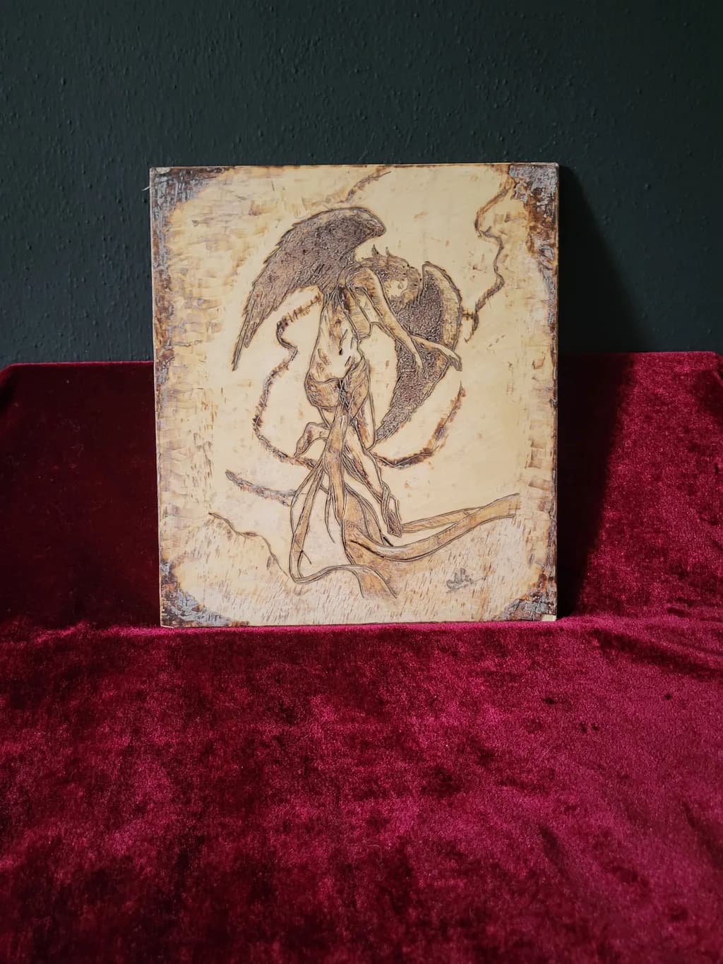 Ethereal Embrace: A Dance of Light and Shadow in Winged Form