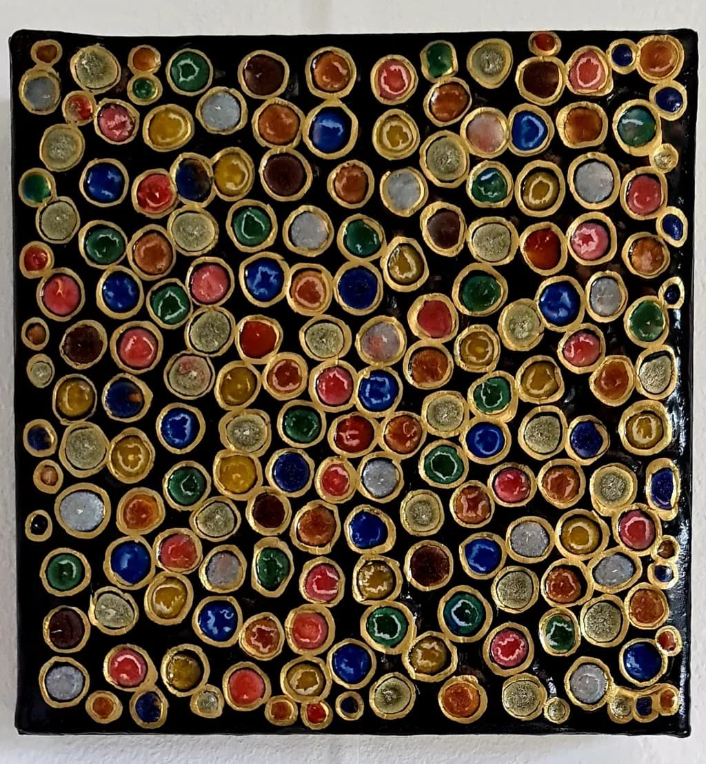 Vibrant Mosaic of Colorful Circles on Black Canvas