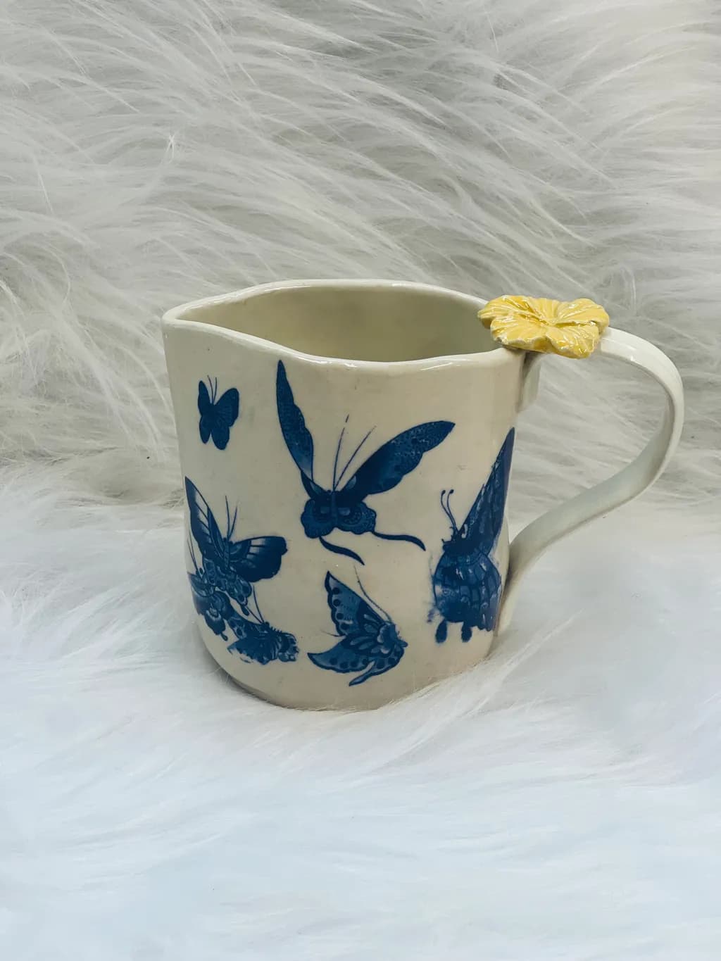 Whimsical Butterfly Pitcher with Floral Accent