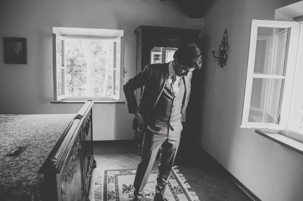 Elegance in Preparation: A Monochrome Reflection of Contemplation and Style