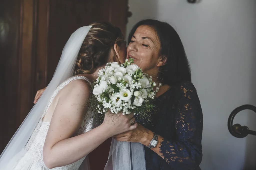 A Moment of Love: A Bride's Tender Embrace with Her Mother