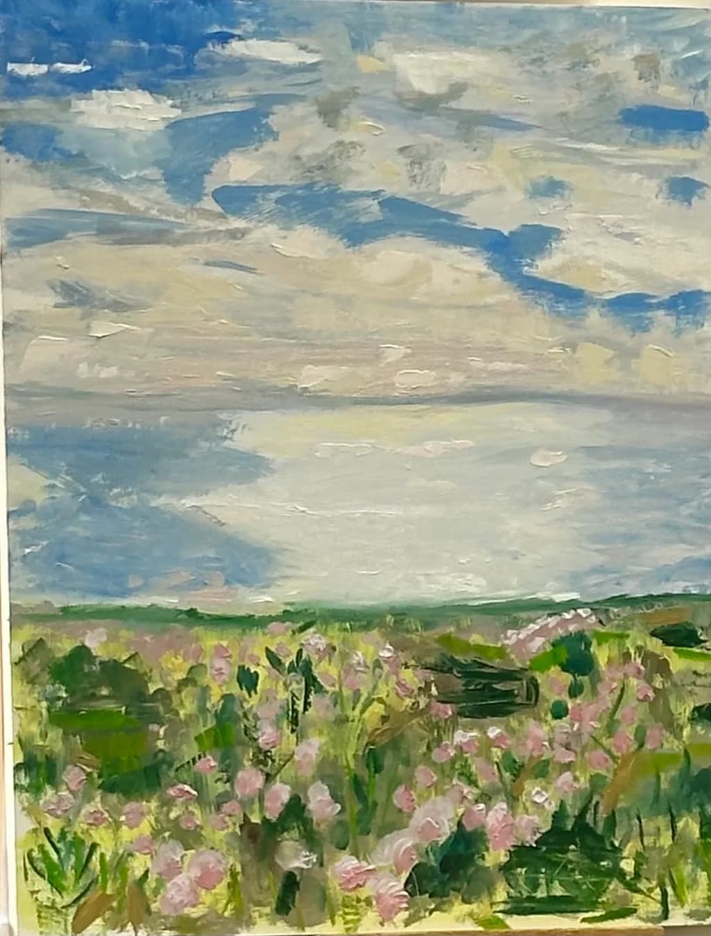 Whispers of Spring: A Lush Meadow Under a Dreamy Sky