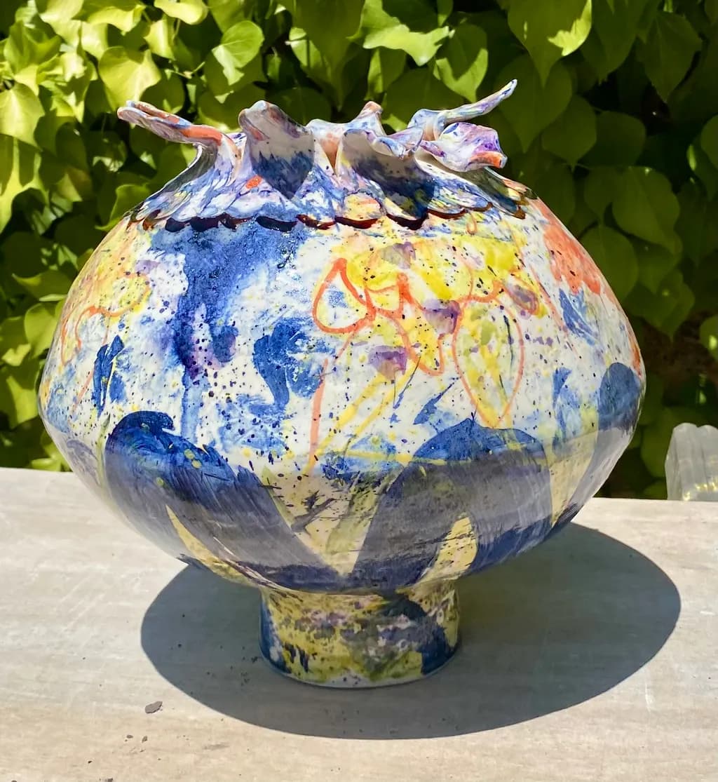 Vibrant Whimsy: A Colorful Ceramic Bowl with Textured Rim