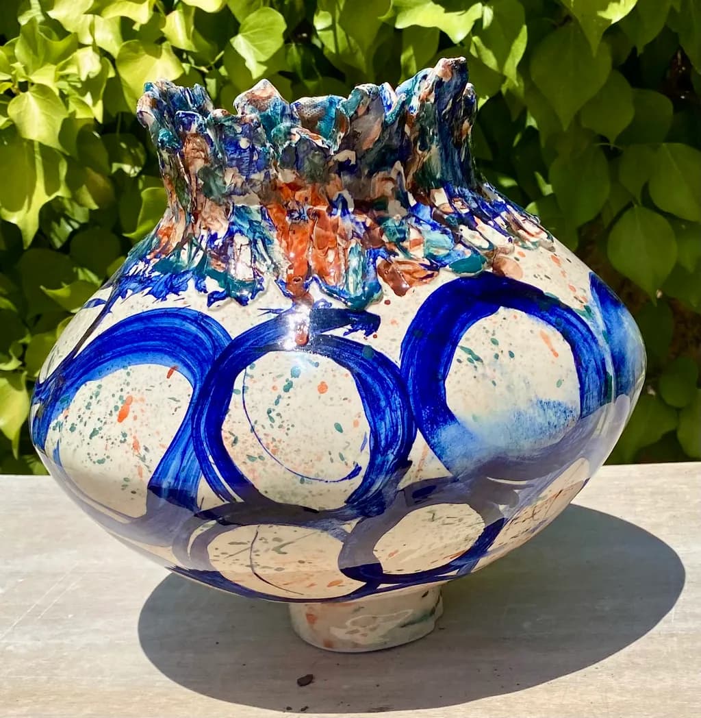 Vibrant Harmony: A Handcrafted Ceramic Vase with Dynamic Blue and Earthy Accents