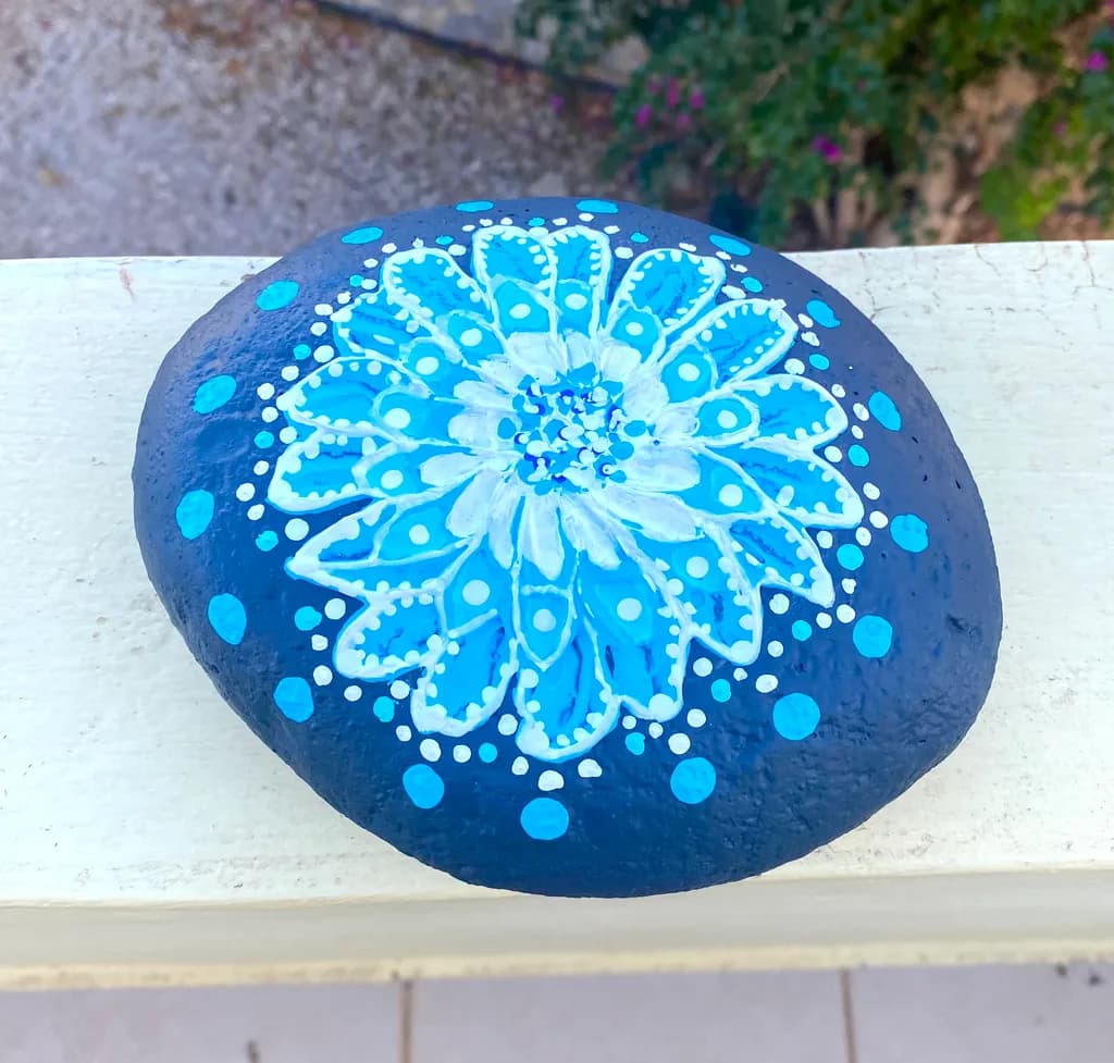Serenity in Blue: Handcrafted Decorative Stone with Intricate Floral Pattern