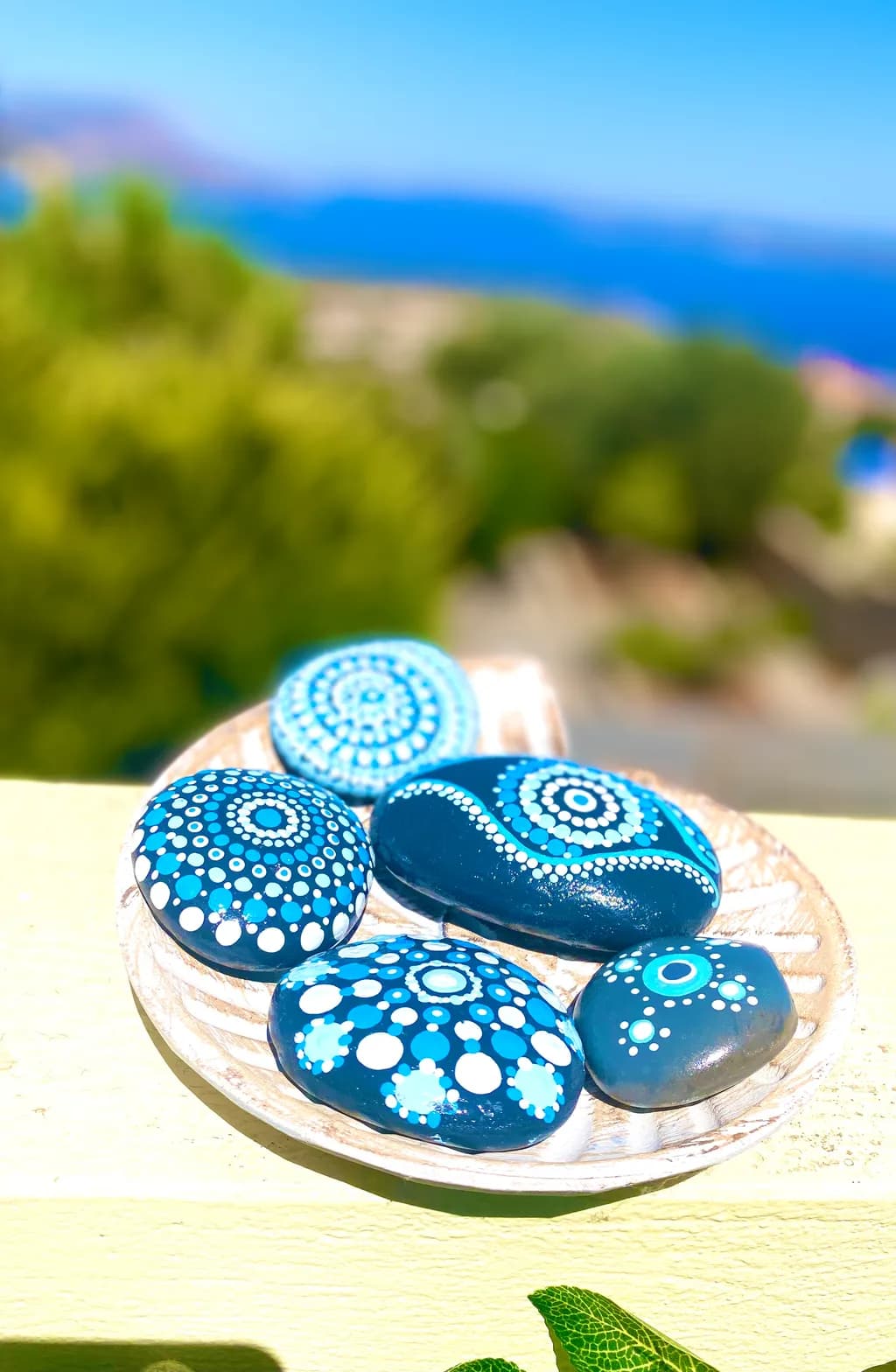 Serenity in Blue: Hand-Painted Decorative Stones with Nature-Inspired Patterns