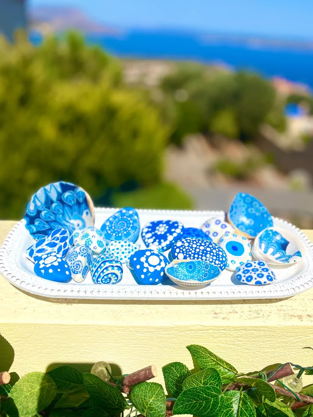 Oceanic Whispers: A Collection of Hand-Painted Blue Stones Celebrating Nature's Beauty