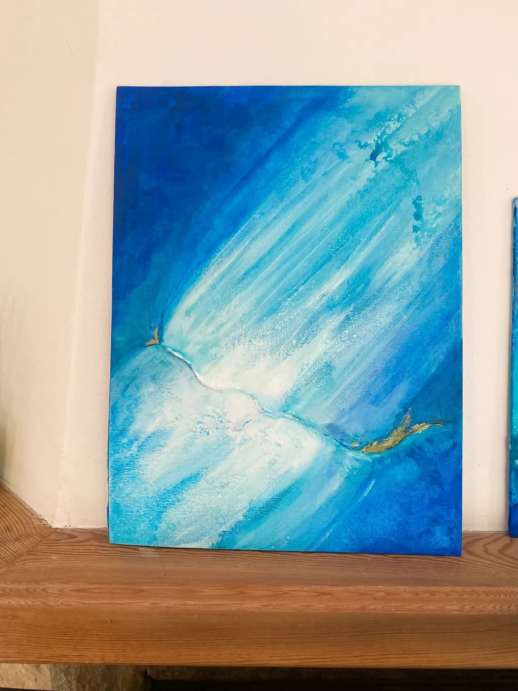Serenity in Blue: An Abstract Journey Through Fluid Textures on Canvas