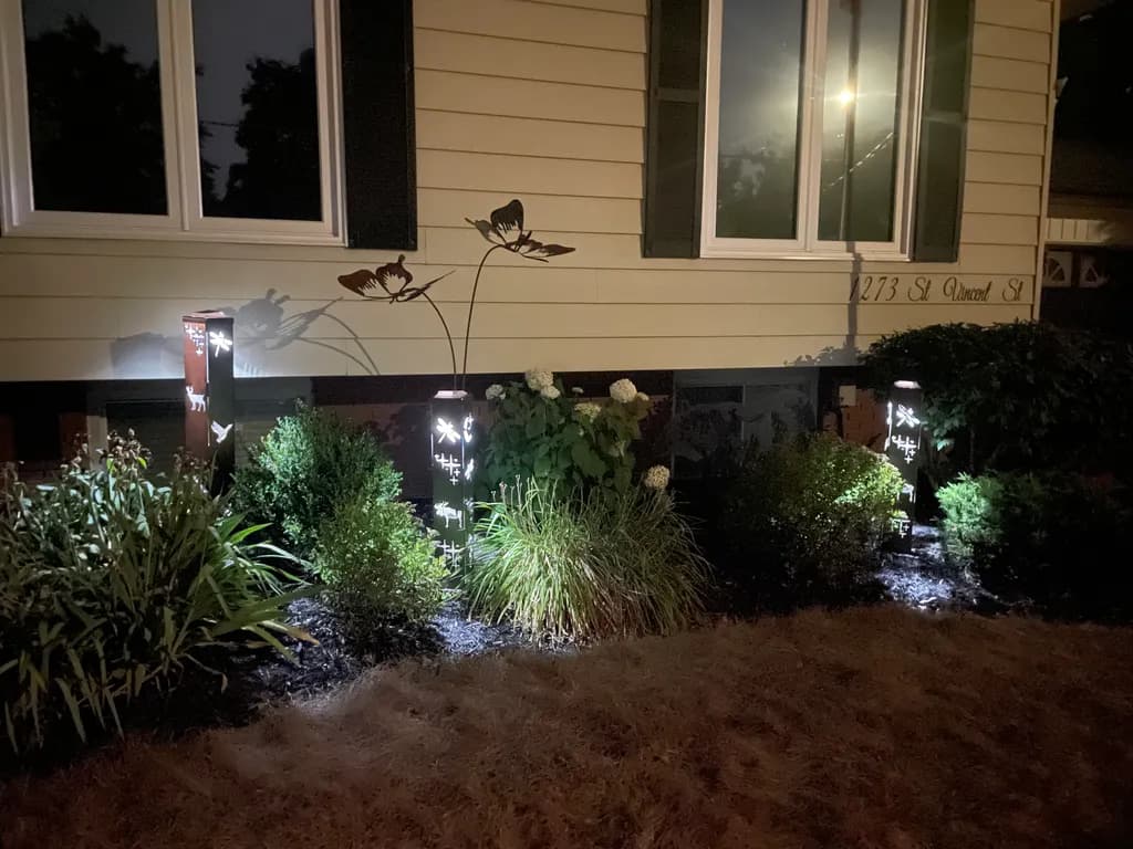 Illuminated Garden Serenity: A Nighttime Dance of Light and Nature