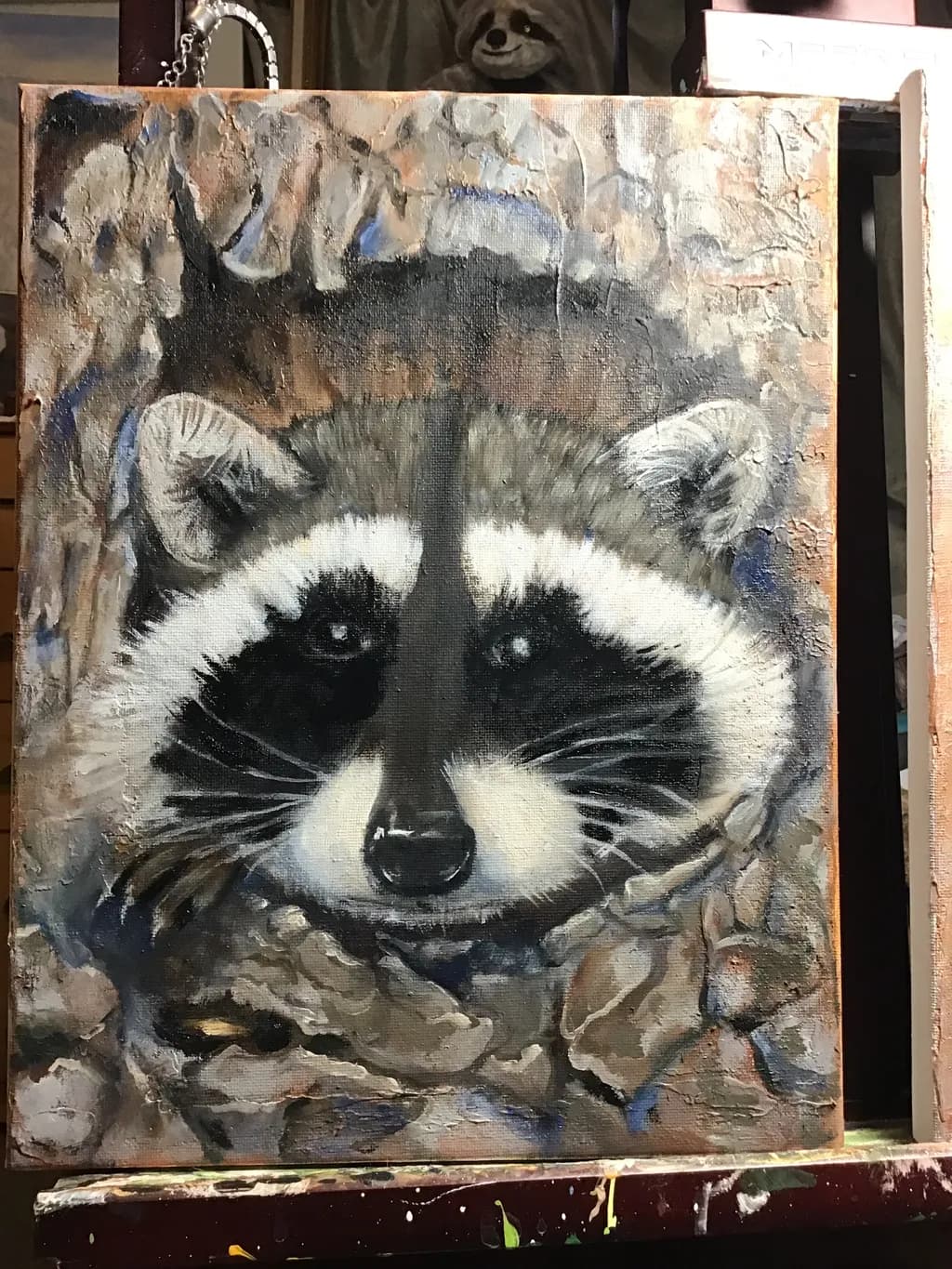 Whiskered Watcher: A Raccoon's Gaze from the Hollowed Tree