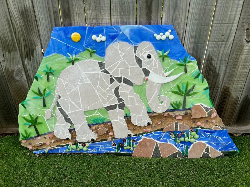 Majestic Journey: A Mosaic Elephant in Nature's Embrace