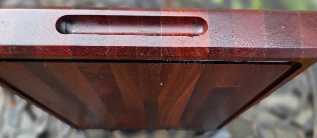 Elegant Mahogany Cutting Board with Unique Handle Design