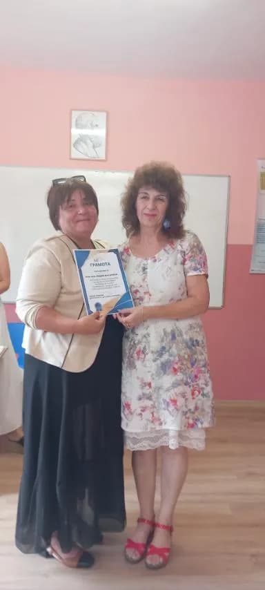 Celebrating Achievement: A Moment of Recognition and Friendship