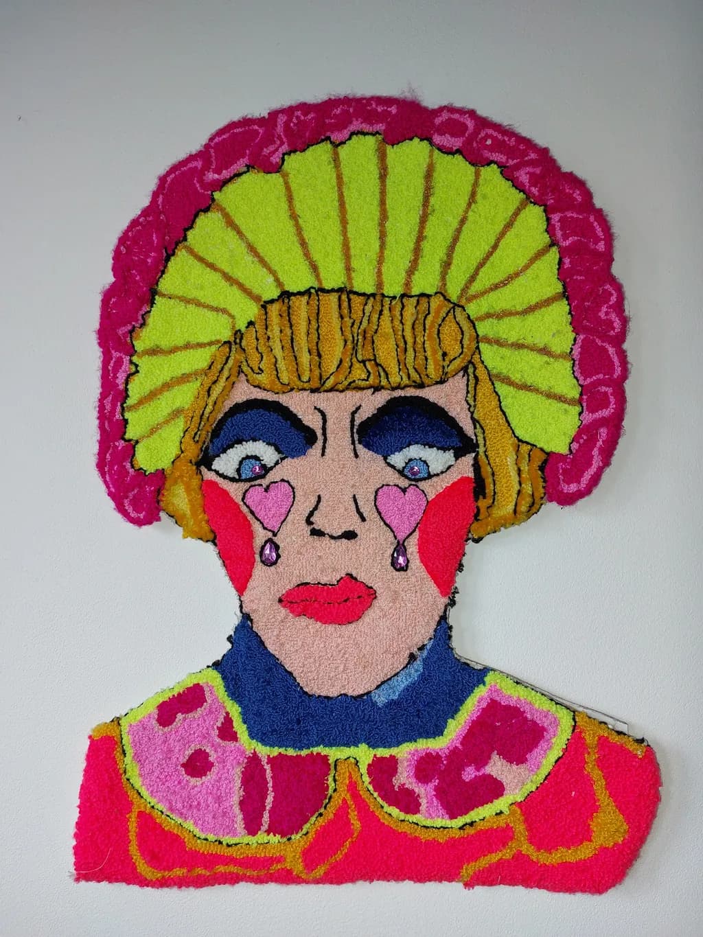 Whimsical Portrait of Emotion: A Colorful Expression in Fiber Art