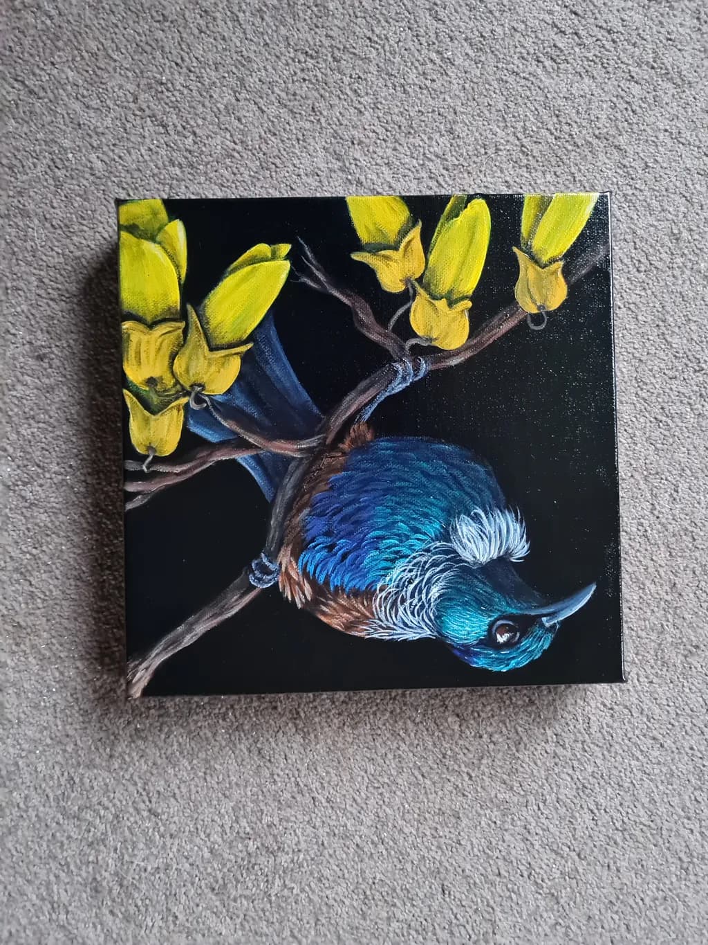 Whispers of Nature: A Vibrant Bird Amidst Golden Blooms