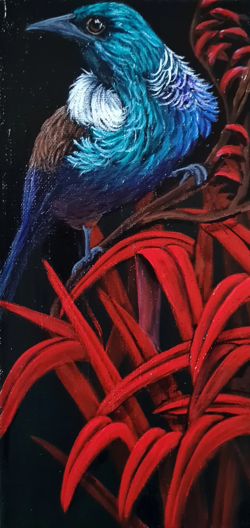 Vibrant Harmony: A Colorful Bird Amidst Lush Red Foliage