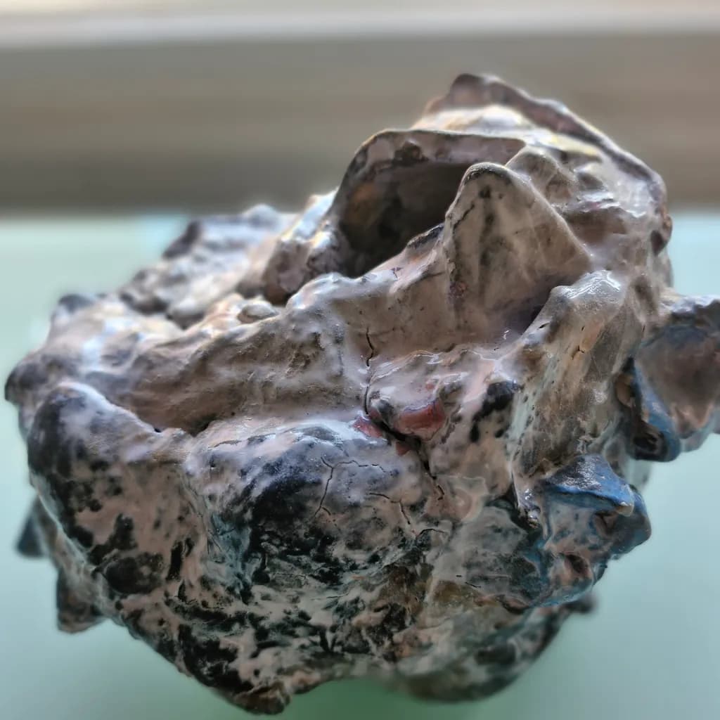 Earth's Textured Essence: A Rocky Mineral Sculpture of Natural Beauty