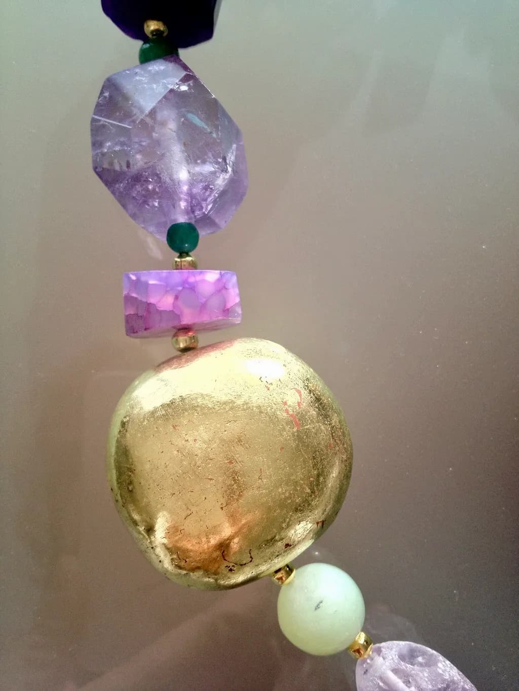 Radiant Harmony: A Fusion of Amethyst and Gold in Elegant Beadwork