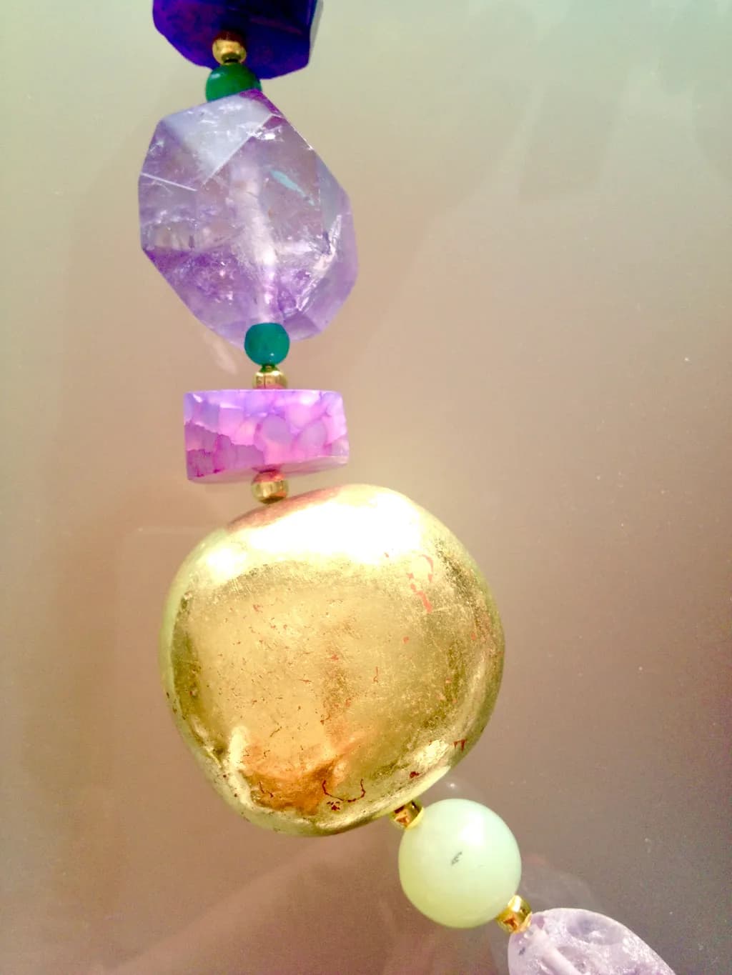 Golden Harmony: A Captivating Blend of Amethyst and Jade Elegance