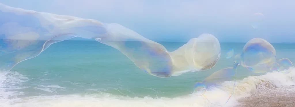 Whispers of the Ocean: Ethereal Bubbles Dancing on the Shoreline