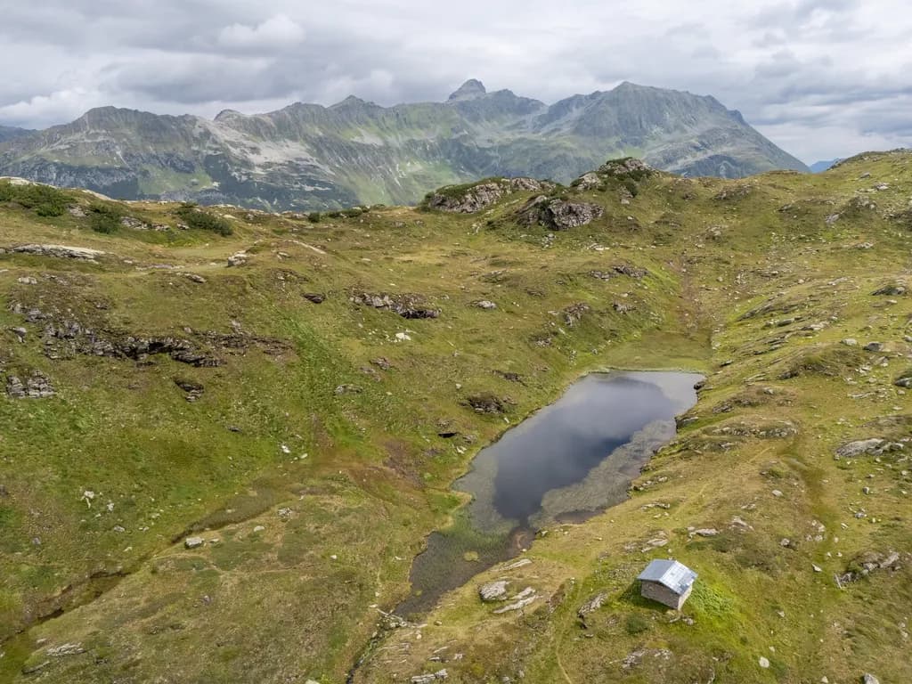 Whispers of Serenity: A Tranquil Alpine Retreat Amidst Majestic Peaks