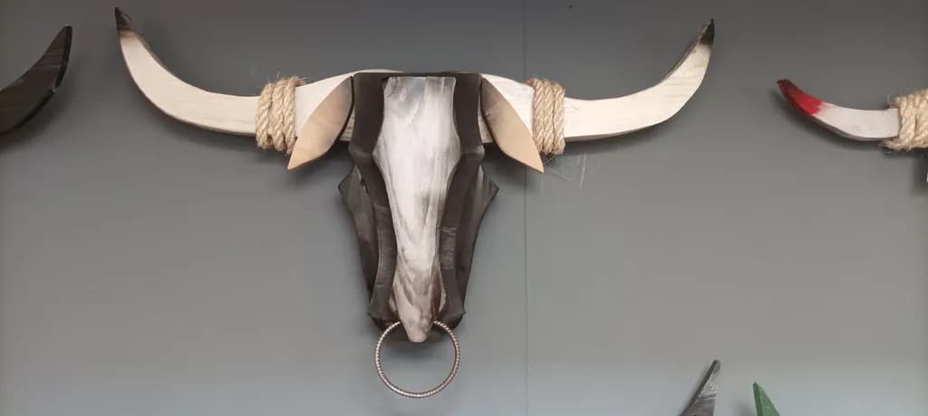 Rustic Elegance: Handcrafted Bull Skull Wall Art with Natural Textures and Earthy Tones