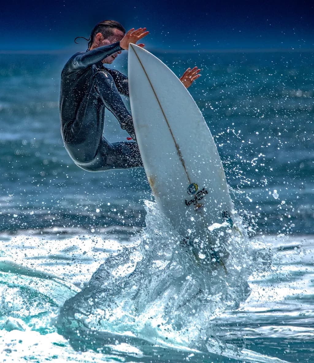 Dynamic Ocean Splash: The Art of Surfing in Motion