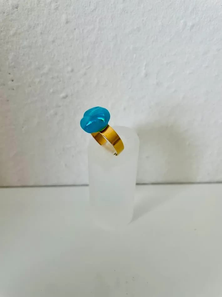 Turquoise Elegance: A Gold-Accented Statement Ring for Modern Aesthetics