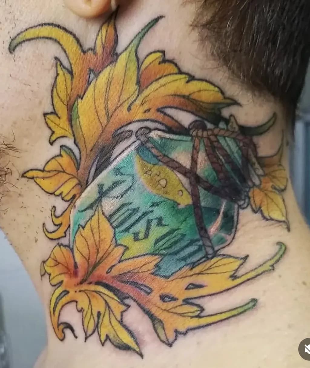 Vibrant Nature's Embrace: A Colorful Tattoo of Leaves and a Jar