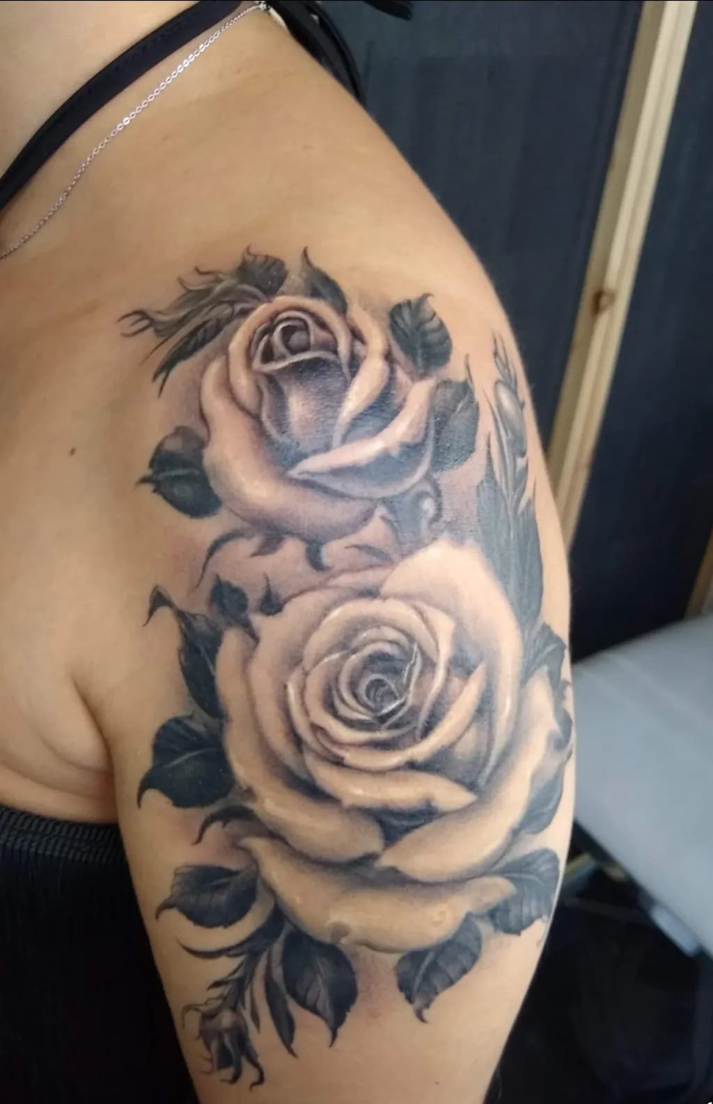 Eternal Blooms: Black and Grey Rose Tattoo Artistry