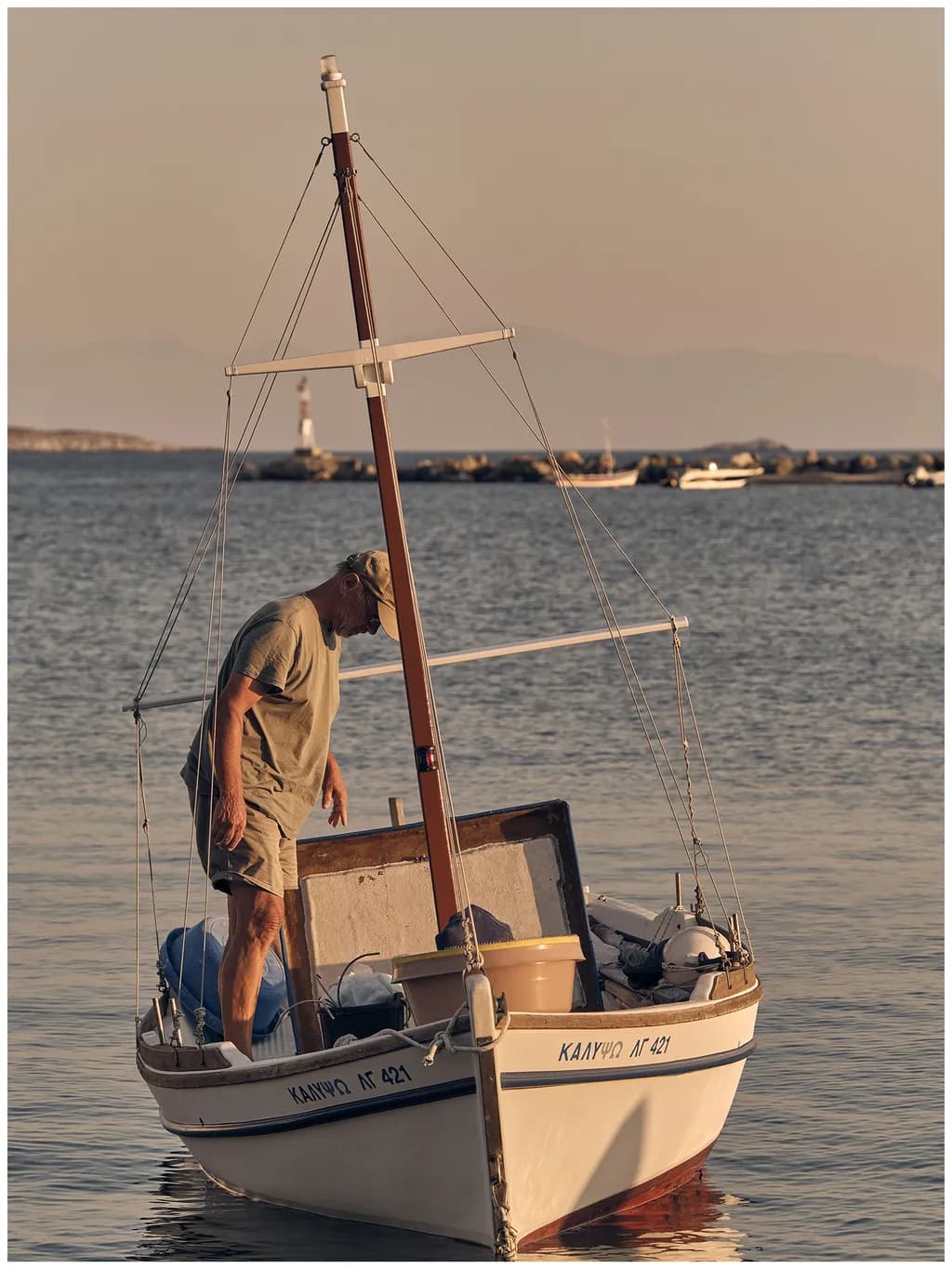 Serenity at Sea: A Fisherman's Dawn on Tranquil Waters