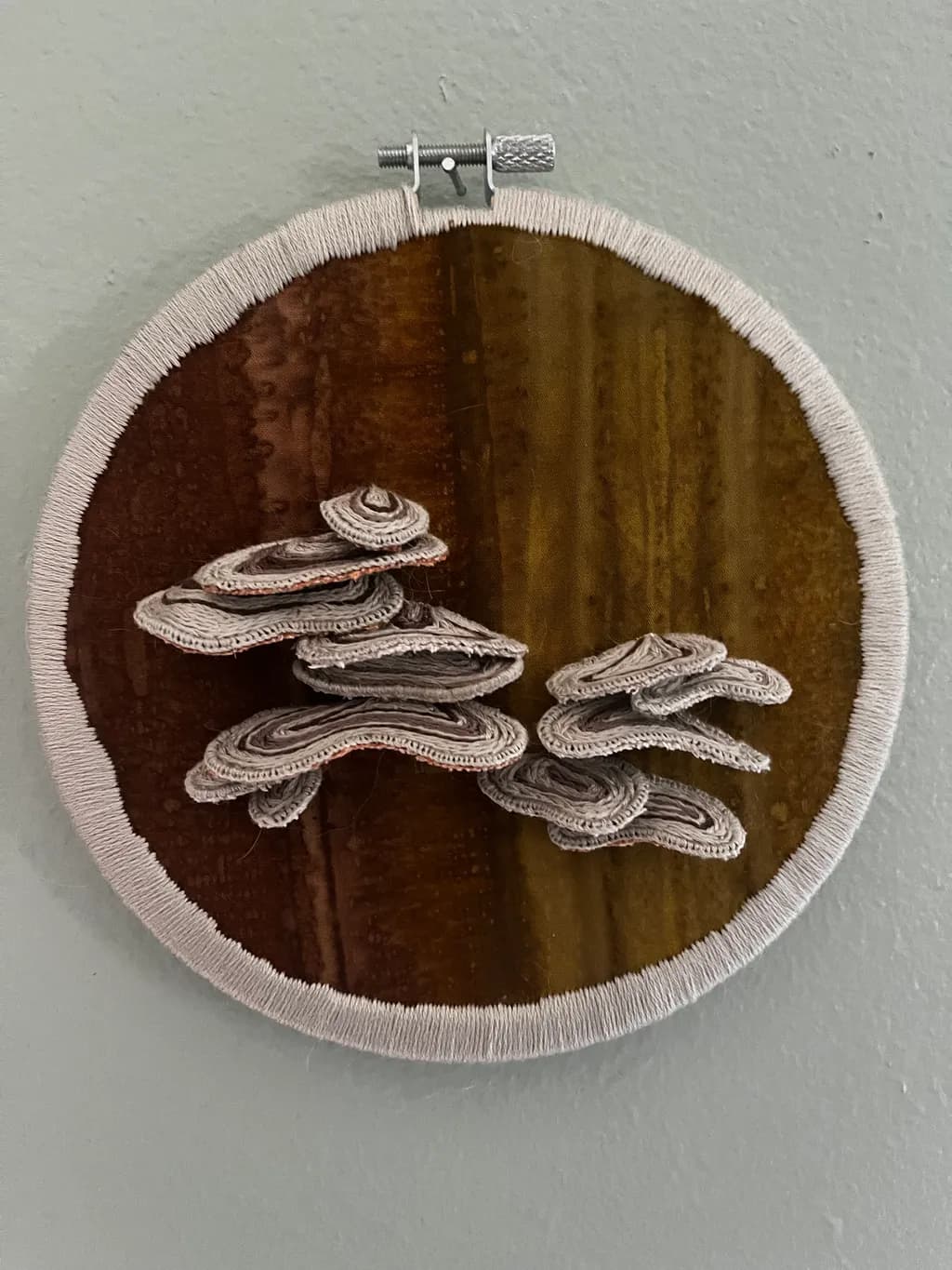 Whispers of Nature: Textured Embroidery on Earthy Tones