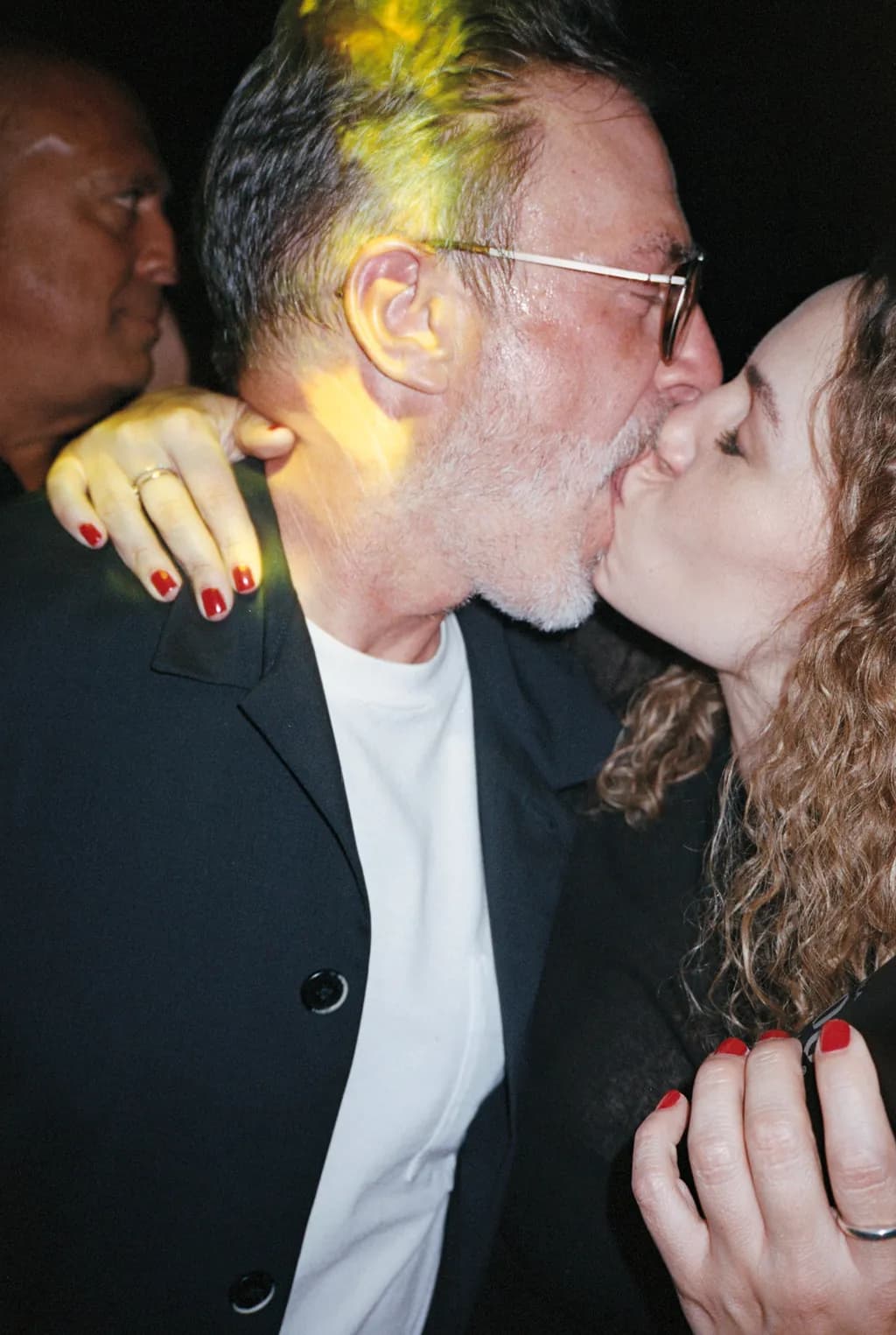 Intimate Moments: A Kiss in the Spotlight
